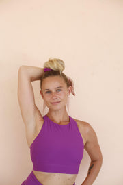 Audra Rose Stanley wearing purple yoga top by Moonah Wear